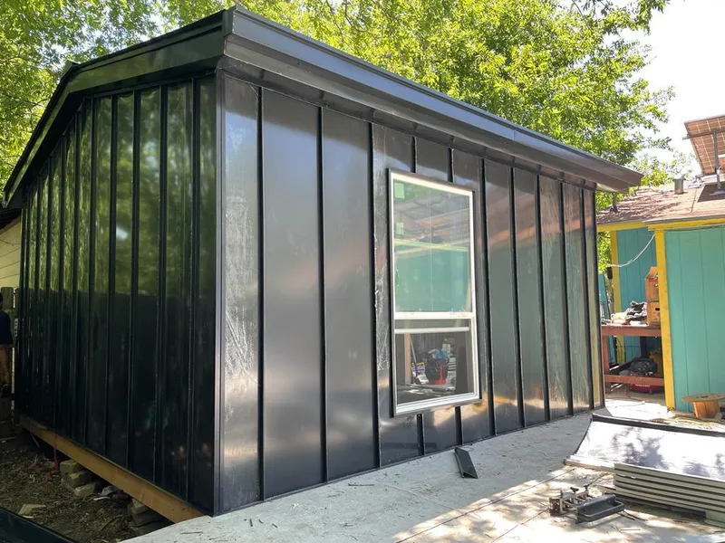 Black standing seam metal wall panels for Metal Roof Installation in Spring Arbor