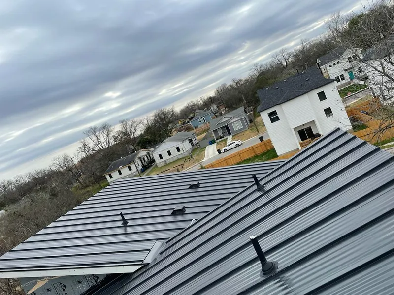 Standing seam metal roof panels with vents for Skylight Repair in Spring Arbor